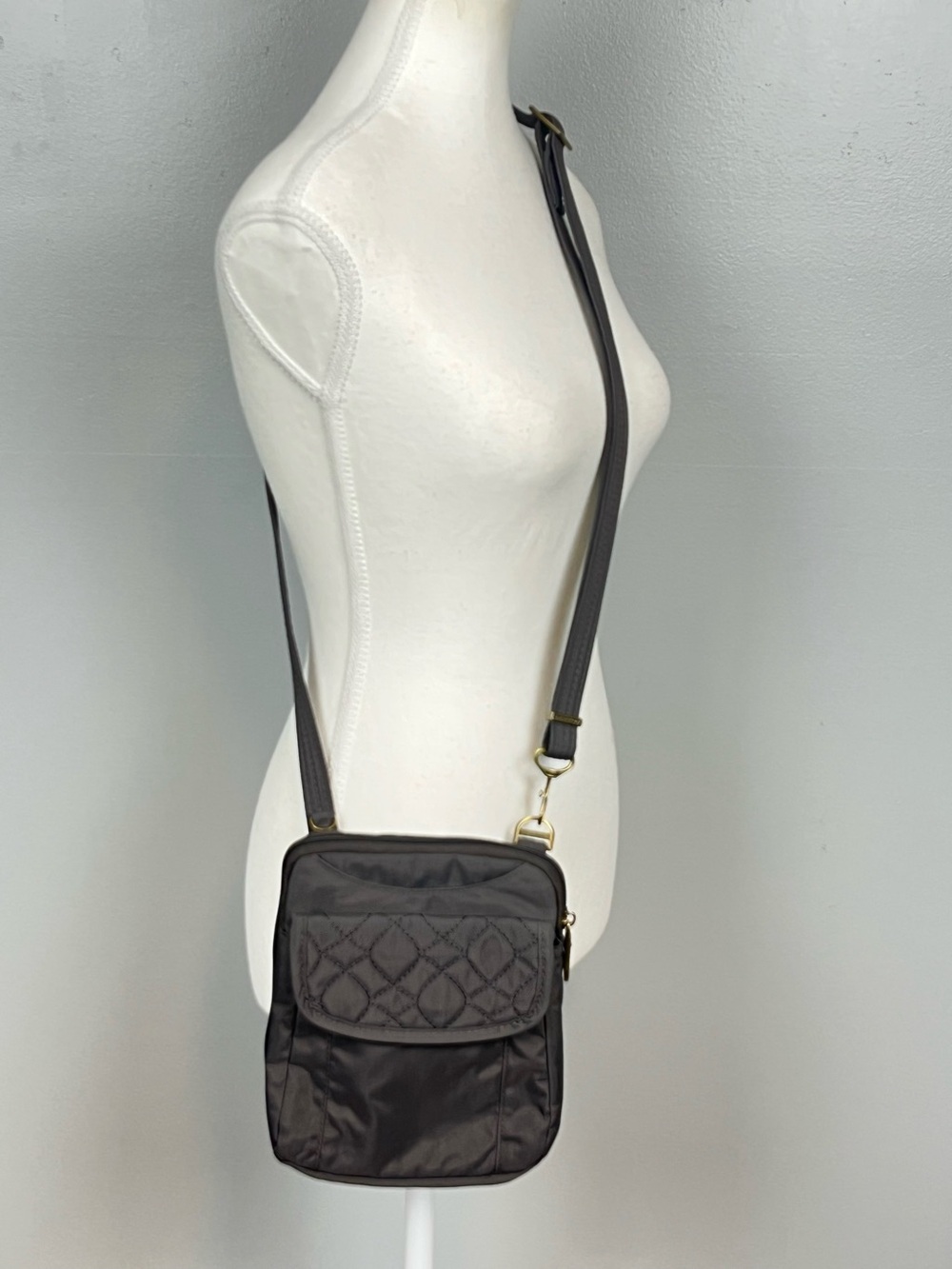 Travelon gray anti theft adjustable strap crossbody bag.